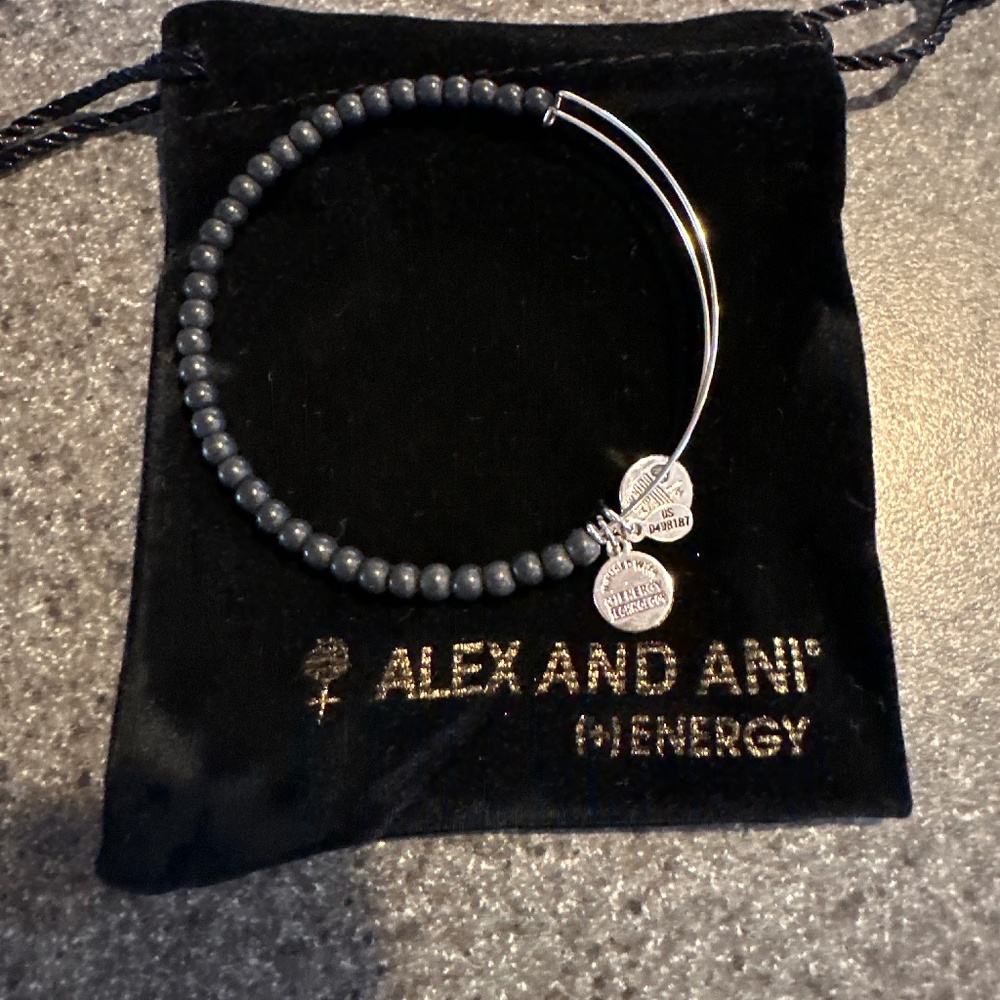 Brand new, never worn Alex and Ani black round bead bracelet